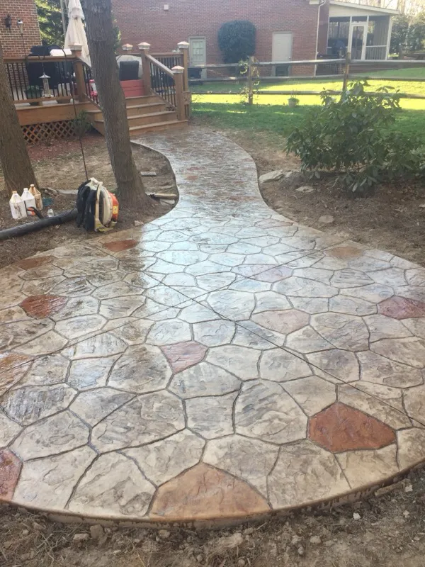 Colored stamped concrete patio installed in Charlotte, NC by Stamped Concrete Artisans